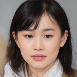 Neutral asian young-adult female with medium  brown hair and brown eyes