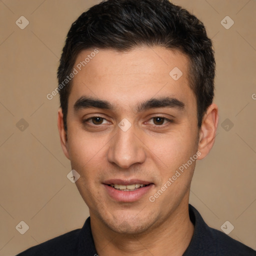 Joyful white young-adult male with short  black hair and brown eyes