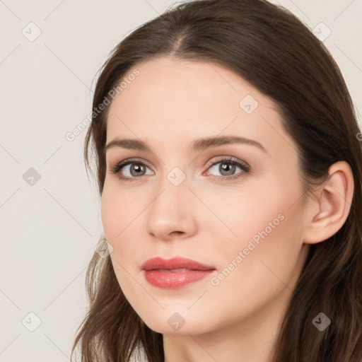 Neutral white young-adult female with long  brown hair and brown eyes