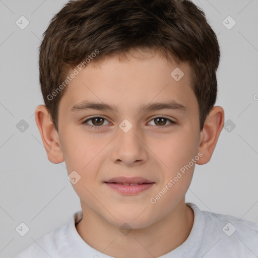 Joyful white child male with short  brown hair and brown eyes