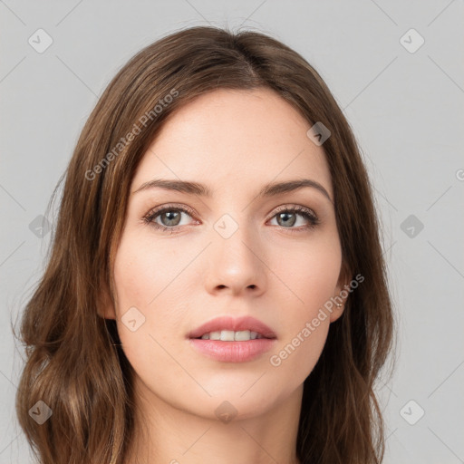 Neutral white young-adult female with long  brown hair and brown eyes