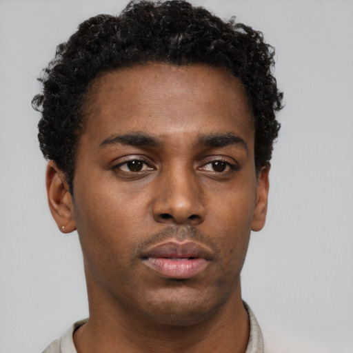 Neutral black young-adult male with short  brown hair and brown eyes