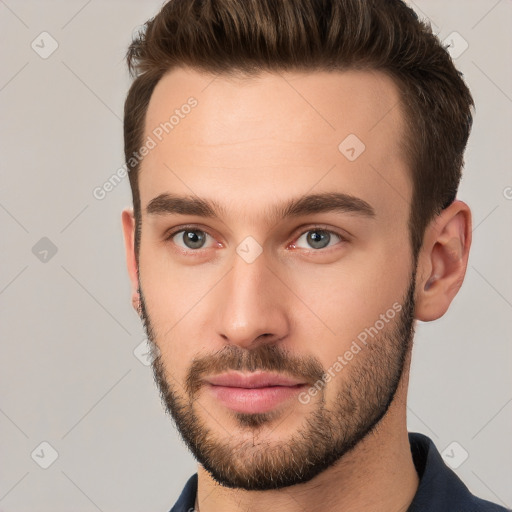 Neutral white young-adult male with short  brown hair and brown eyes