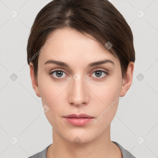 Neutral white young-adult female with short  brown hair and brown eyes