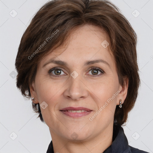 Joyful white adult female with medium  brown hair and grey eyes