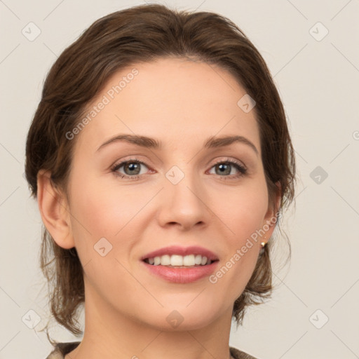 Joyful white young-adult female with medium  brown hair and green eyes