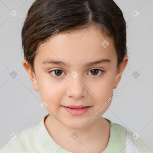 Joyful white child female with short  brown hair and brown eyes