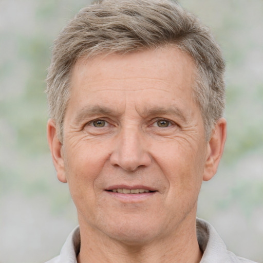 Joyful white middle-aged male with short  brown hair and brown eyes