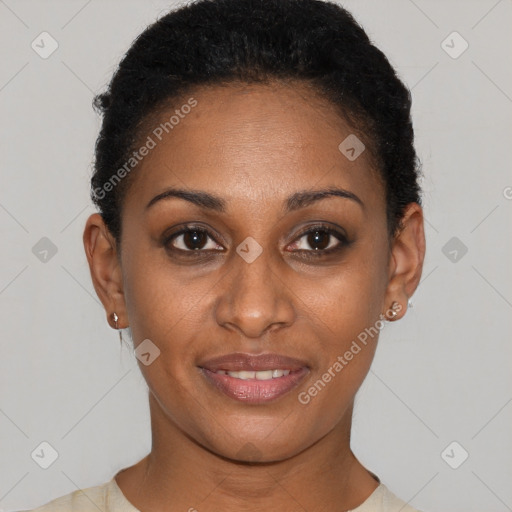 Joyful black young-adult female with short  brown hair and brown eyes