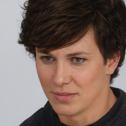 Joyful white adult female with short  brown hair and brown eyes