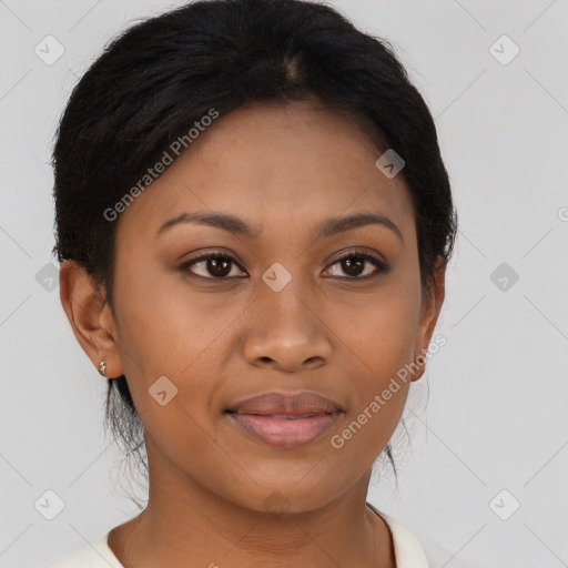 Joyful latino young-adult female with short  brown hair and brown eyes