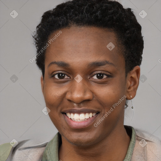 Joyful black young-adult female with short  brown hair and brown eyes