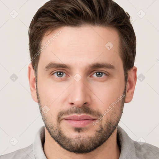 Neutral white young-adult male with short  brown hair and grey eyes