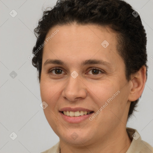 Joyful white adult female with short  brown hair and brown eyes