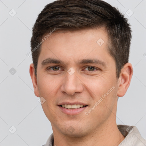 Joyful white young-adult male with short  brown hair and brown eyes