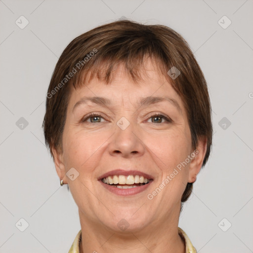 Joyful white adult female with short  brown hair and brown eyes