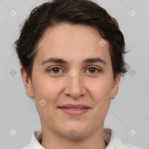 Joyful white adult female with short  brown hair and brown eyes