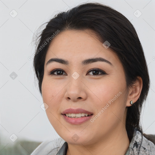 Joyful asian young-adult female with medium  black hair and brown eyes