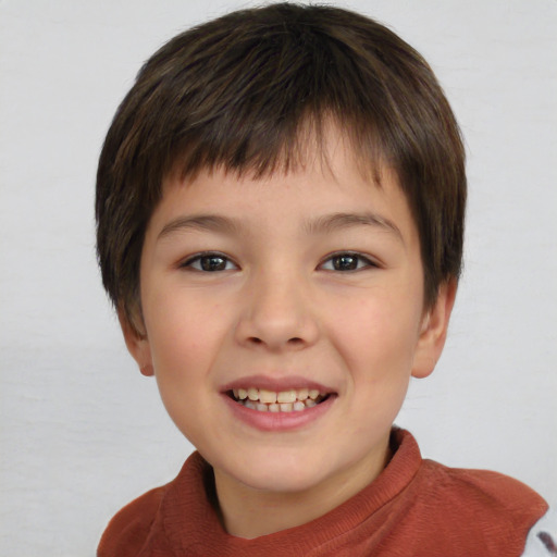 Joyful white child female with short  brown hair and brown eyes