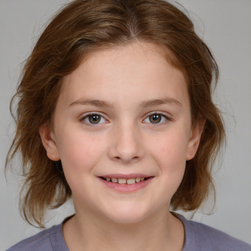 Joyful white child female with medium  brown hair and brown eyes