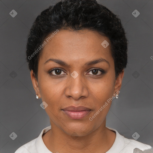 Joyful black young-adult female with short  black hair and brown eyes