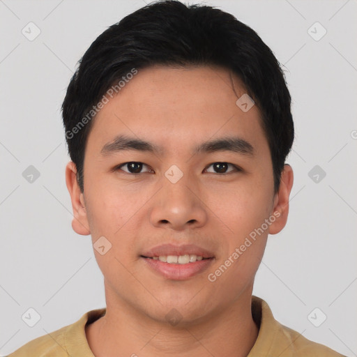 Joyful asian young-adult male with short  black hair and brown eyes