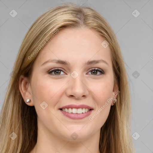 Joyful white young-adult female with long  brown hair and brown eyes