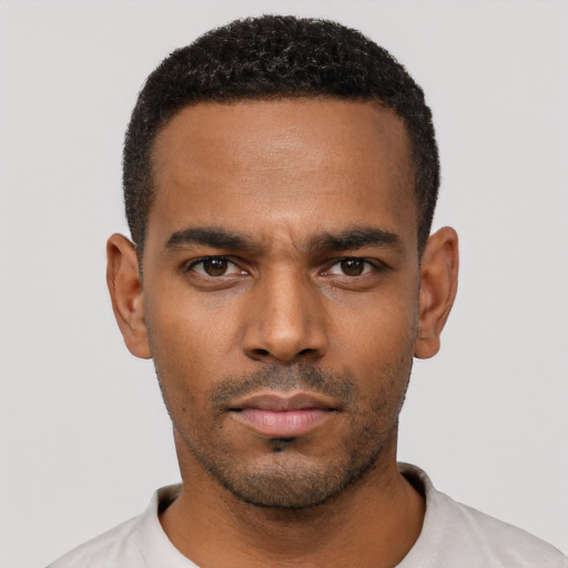 Neutral black young-adult male with short  black hair and brown eyes