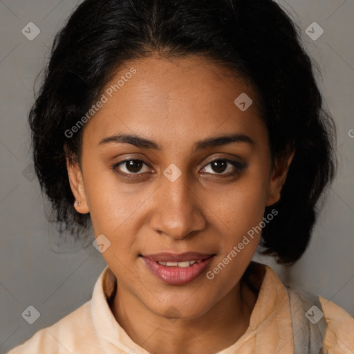 Joyful latino young-adult female with medium  brown hair and brown eyes