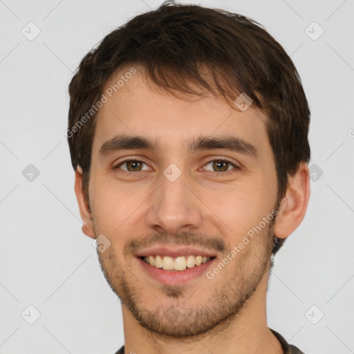 Joyful white young-adult male with short  brown hair and brown eyes