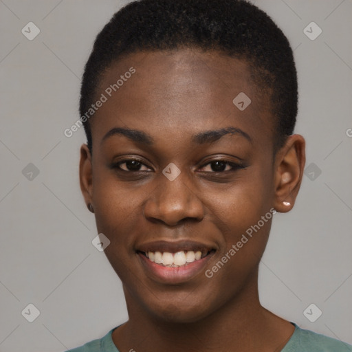 Joyful black young-adult female with short  brown hair and brown eyes