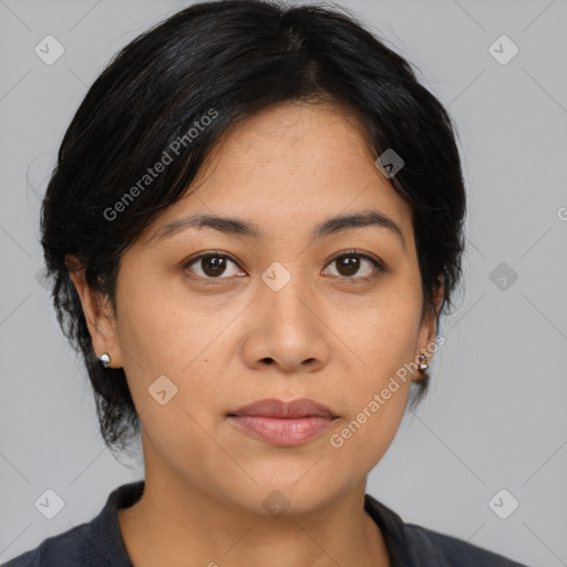 Joyful asian young-adult female with medium  black hair and brown eyes