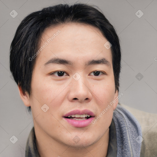 Joyful asian young-adult male with short  black hair and brown eyes