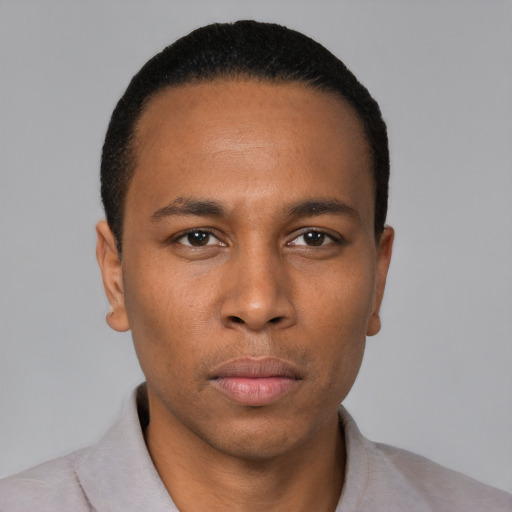 Neutral black young-adult male with short  black hair and brown eyes