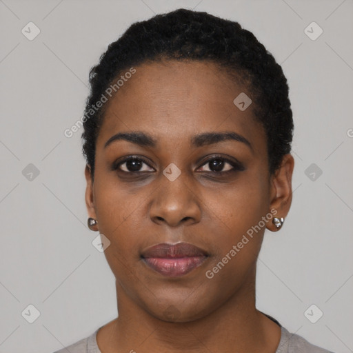 Neutral black young-adult female with short  black hair and brown eyes