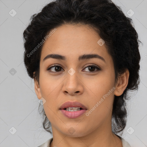 Joyful latino young-adult female with long  brown hair and brown eyes