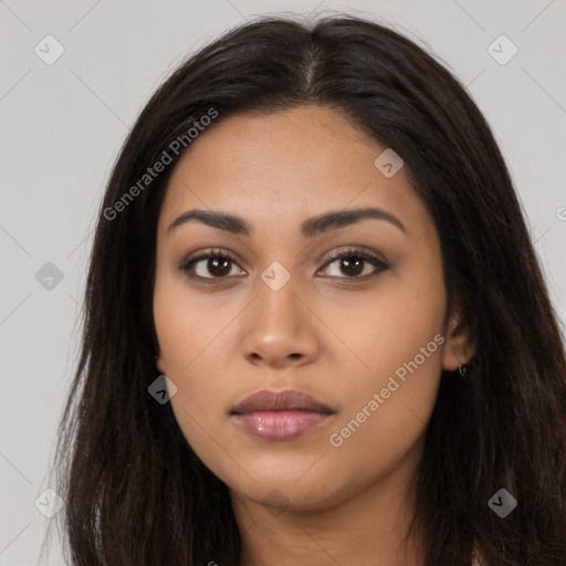 Neutral latino young-adult female with long  brown hair and brown eyes