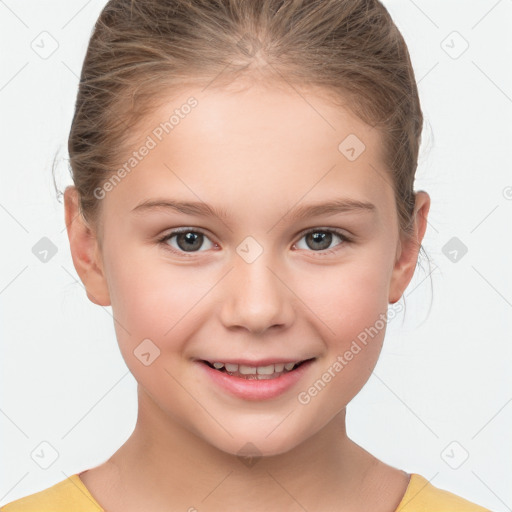 Joyful white child female with short  brown hair and brown eyes