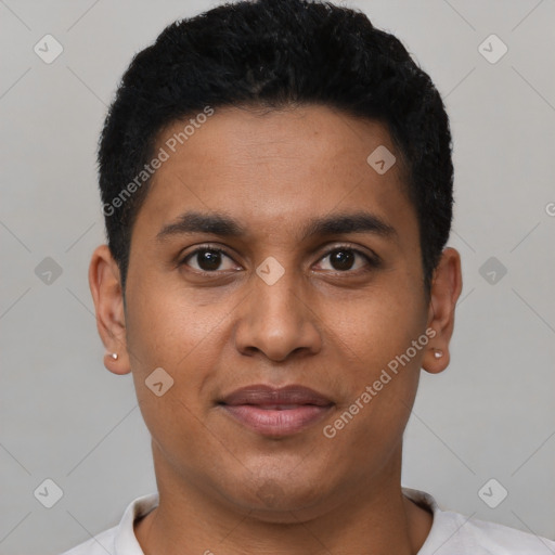 Joyful latino young-adult male with short  black hair and brown eyes