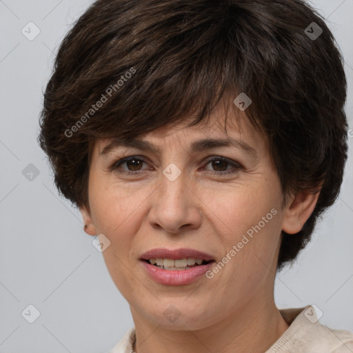 Joyful white adult female with short  brown hair and brown eyes