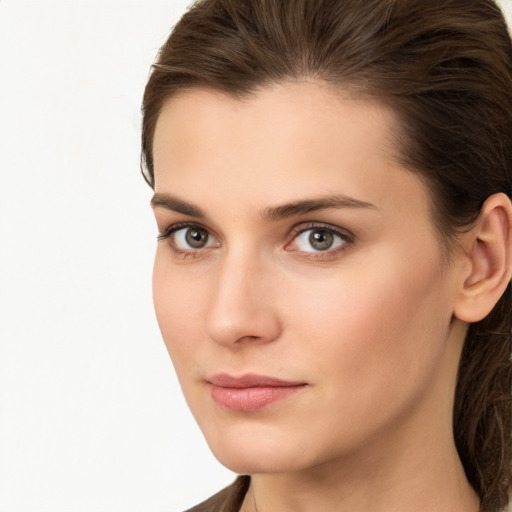 Neutral white young-adult female with medium  brown hair and brown eyes