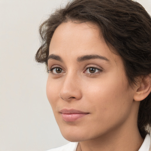 Neutral white young-adult female with medium  brown hair and brown eyes