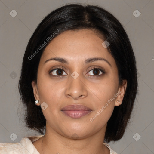 Joyful latino young-adult female with medium  brown hair and brown eyes