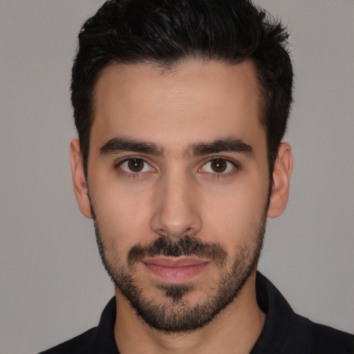 Neutral white young-adult male with short  black hair and brown eyes