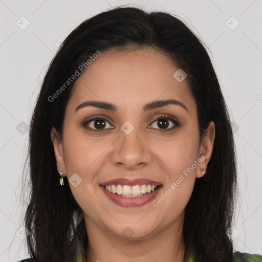 Joyful latino young-adult female with long  brown hair and brown eyes