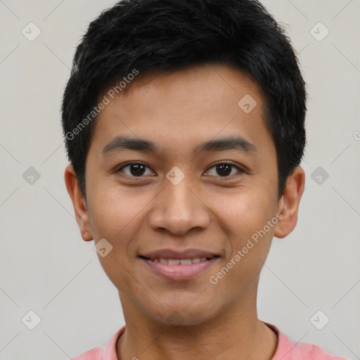 Joyful latino young-adult male with short  black hair and brown eyes