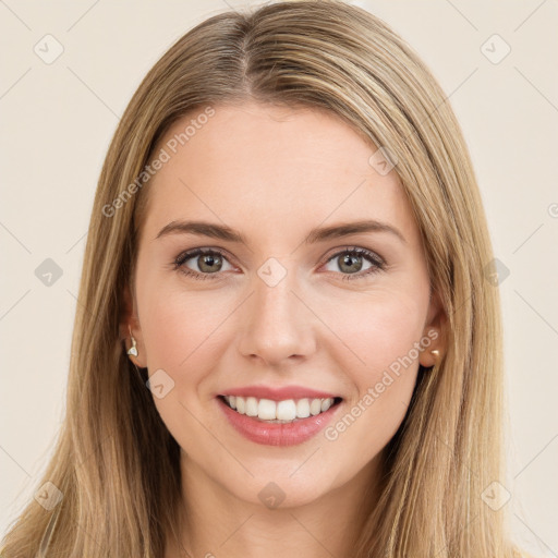 Joyful white young-adult female with long  brown hair and green eyes