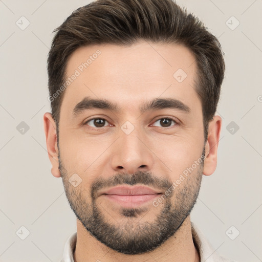 Joyful white young-adult male with short  brown hair and brown eyes