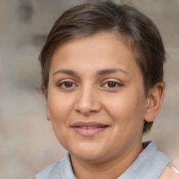 Joyful white adult female with short  brown hair and brown eyes