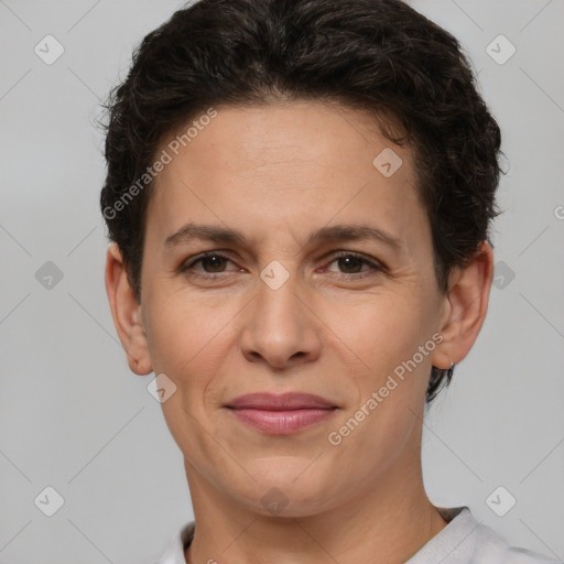 Joyful white adult female with short  brown hair and brown eyes